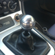 I tested the ball knob on the shifter and found that the hole and the threading were too big. You can also see the deep gouge the vice had made on the ball.